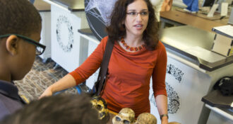 Dr. Briana Pobiner communicates with the public about fossil humans