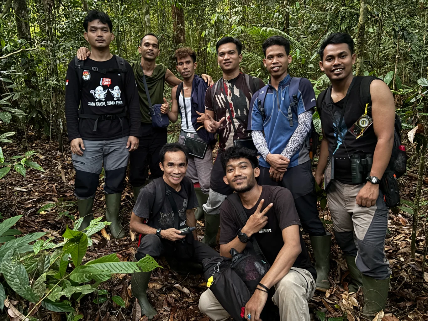 Gunung Palung Orangutan Project field assistants in the forest in Gunung Palung National Park, Indonesia.